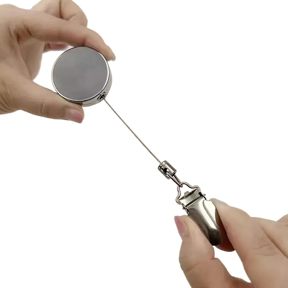 Clips retráctiles adhesivos para trapos de cocina